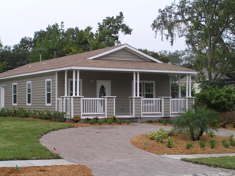 Modular home with front porch and circular drive