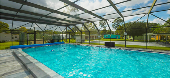 Large screened-in swimming pool