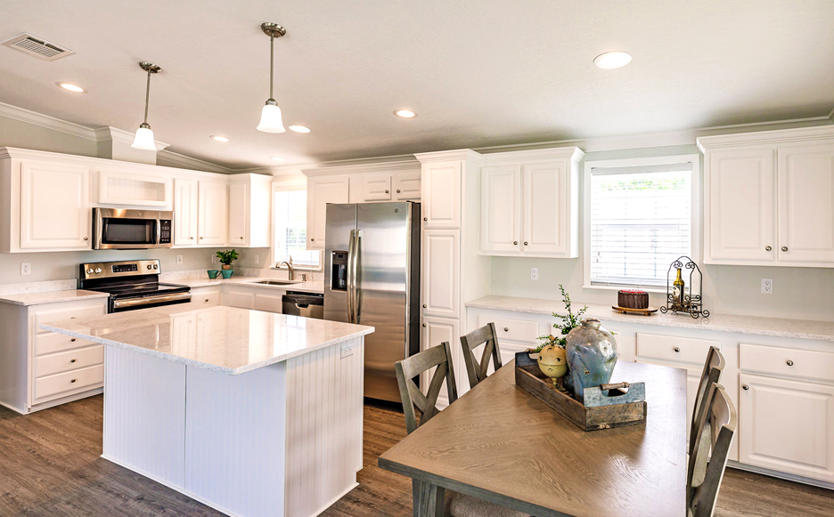 Kitchen with White Cabinets and Stainless Steel appliances