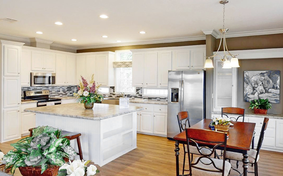 Kitchen with White Cabinets and large Island