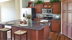 Kitchen with a large pantry and island