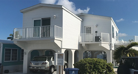 Home on stilts with parking below