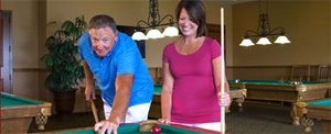 Couple playing Billiards