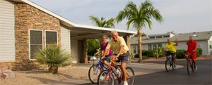 People biking through the community