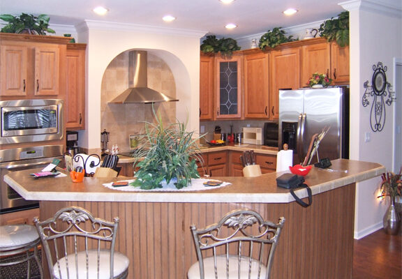 Kitchen with Euro Range Hood and large eat at island