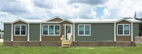 Exterior of home with two dormers